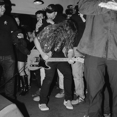 guitarist jamming out with crowd